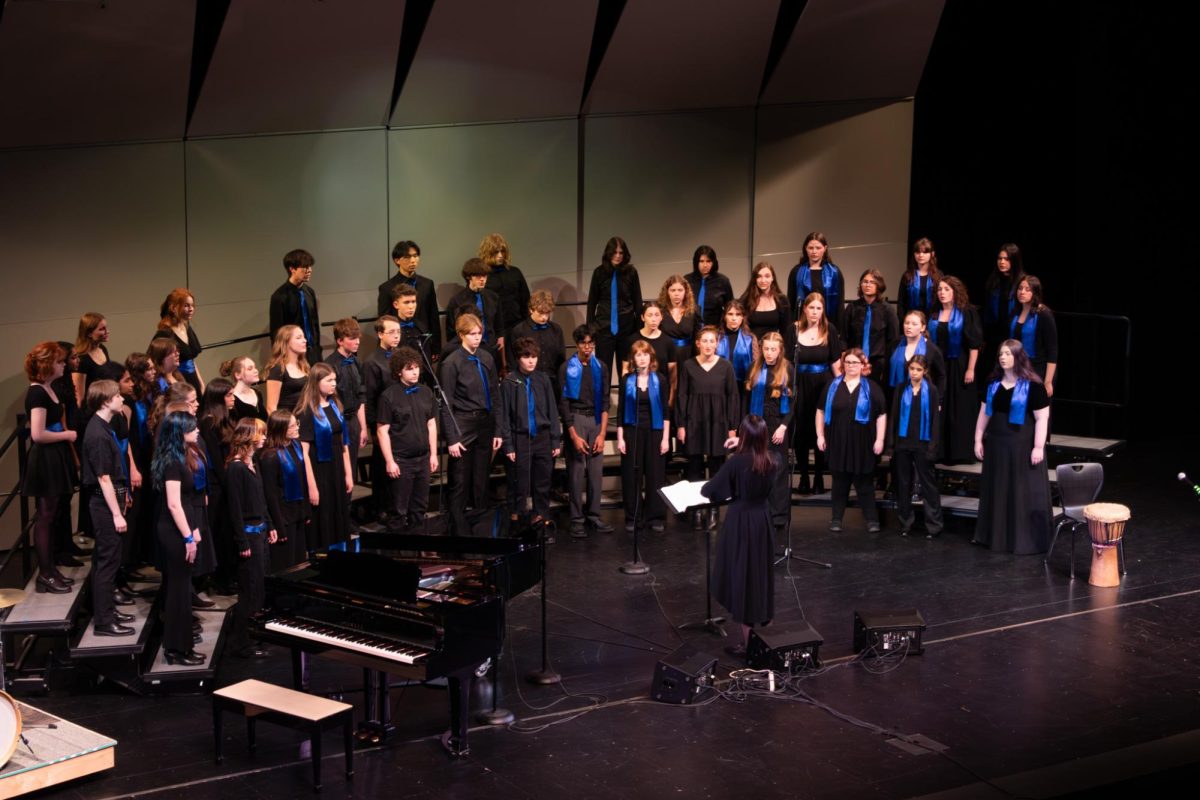Symphonic choir performs in Winter Concerts. They wear their iconic concert blacks, accented with an array of scarves, ties, and bow ties. 