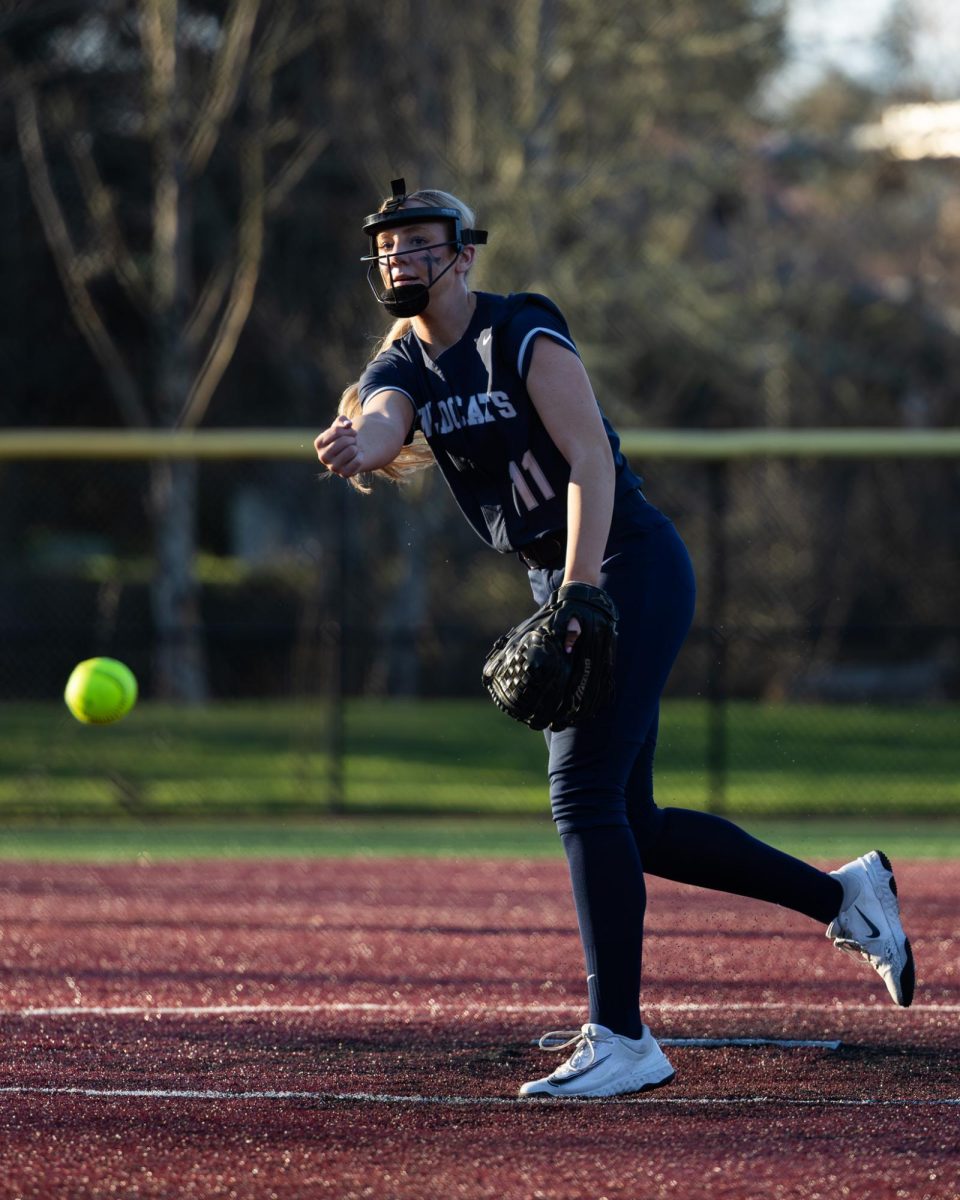 Sophomore Addi Smith throws a pitch in their pre-season Jamboree. Wilsonville will take on Milwaukee In their first league game tonight at 5.
