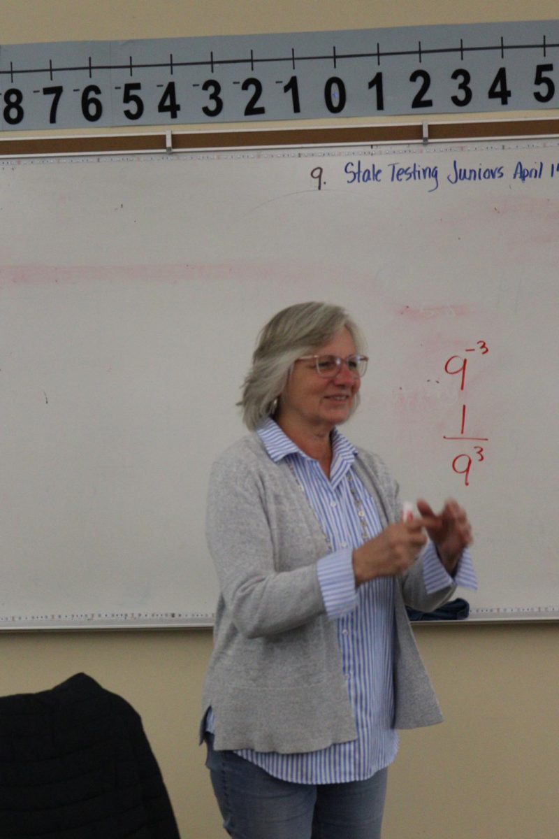 Mrs. Lockwood is shown teaching math in her 4th period class. Mrs. Lockwood is one of the teachers at Wilsonville who has implemented the 4-point grading scale.