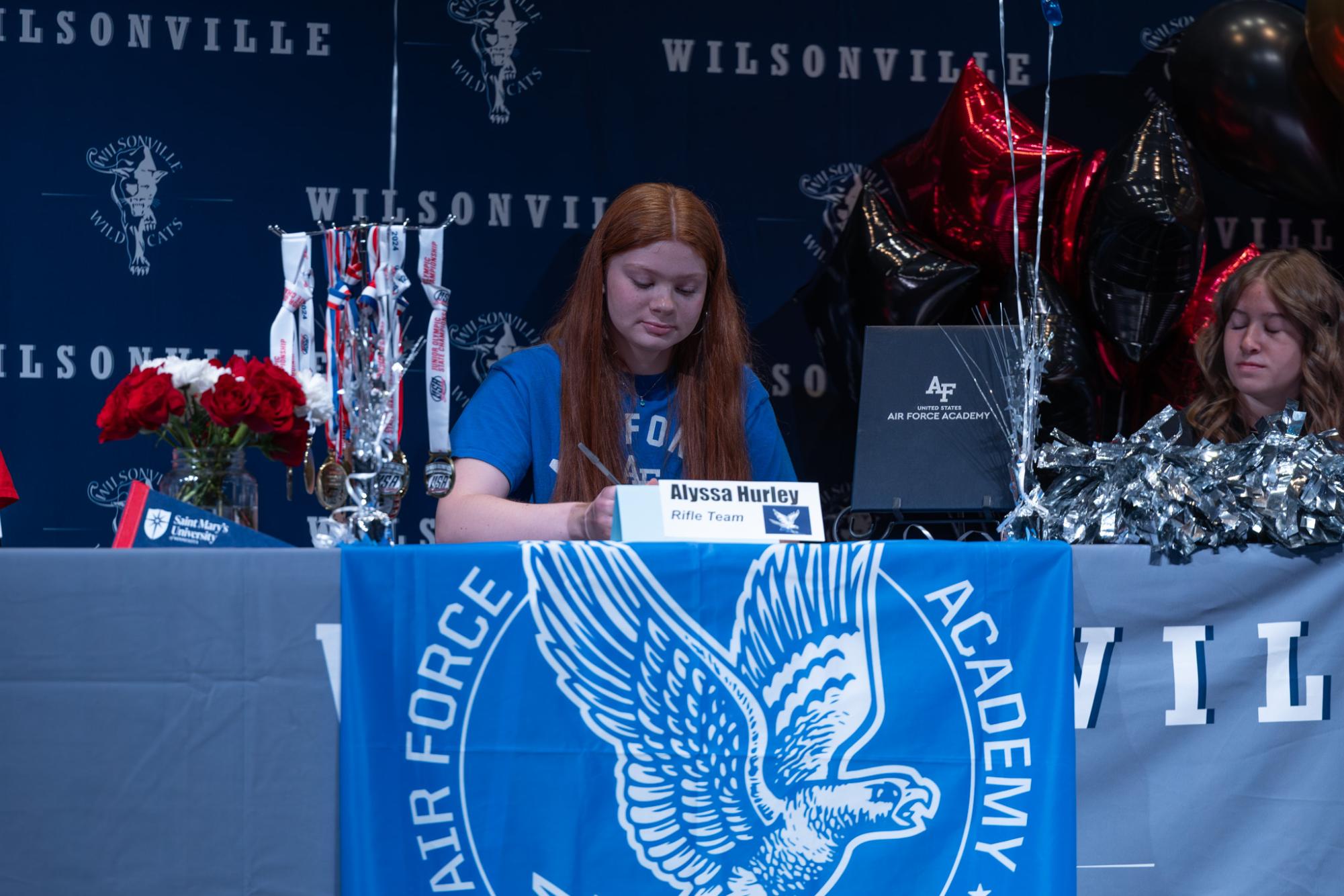 Alyssa Hurley signs her letter of intent. She will attend Air Force Academy next school year.