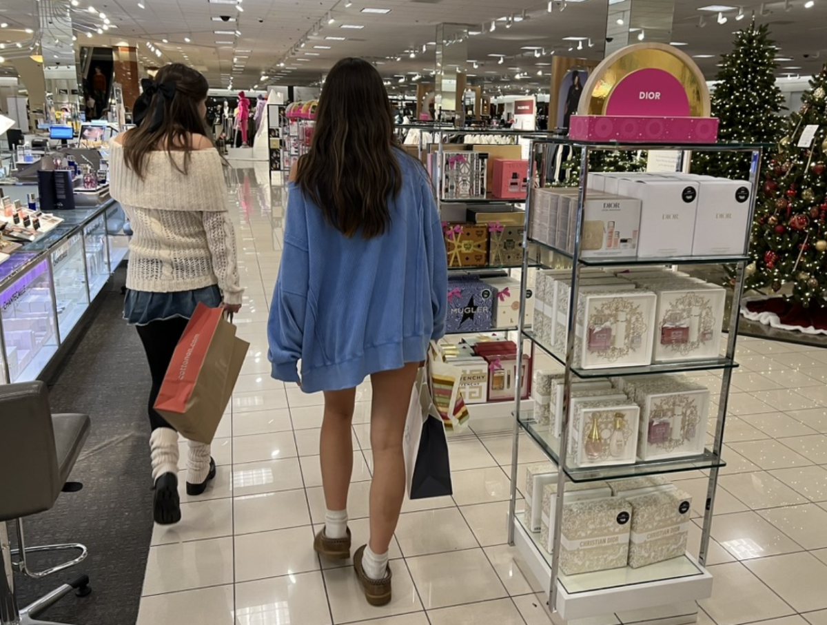 Senior Sofia Kerner, 17, and her older sister, Keira Kerner, 20, an alumni from Wilsonville High, are captured enjoying Christmas gift shopping in the mall. Does this look like a crime to you?