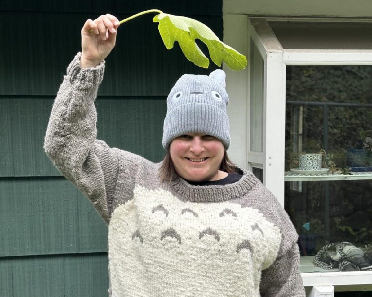 Kate Coreson poses under a leaf as Totoro. She loves to dress up in her own time, theater always finding a way in her heart.  Provided by Kate Coreson