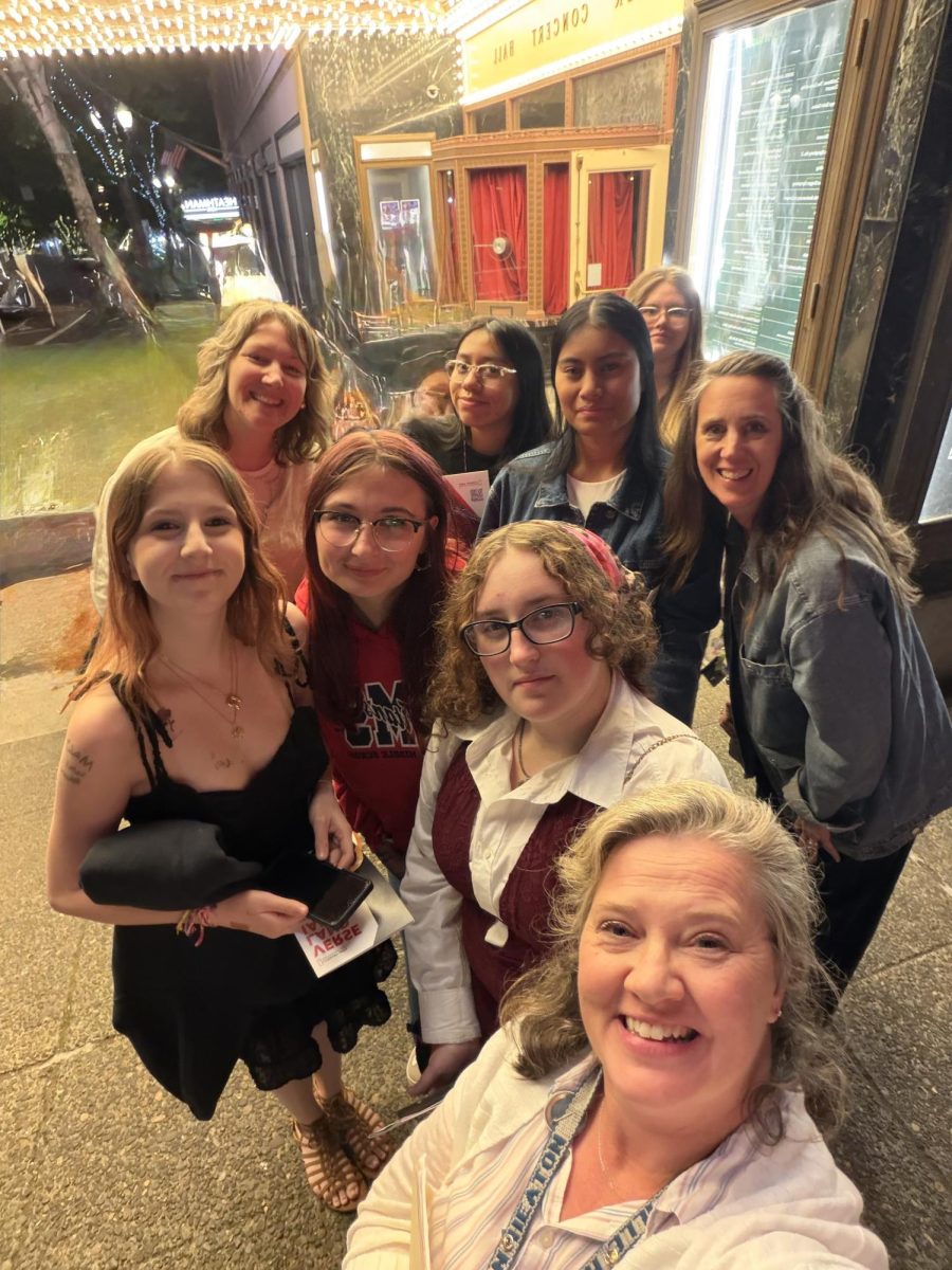 The group of staff and students who visited Portlandia. Prior to the event, the group dressed up and ate dinner downtown